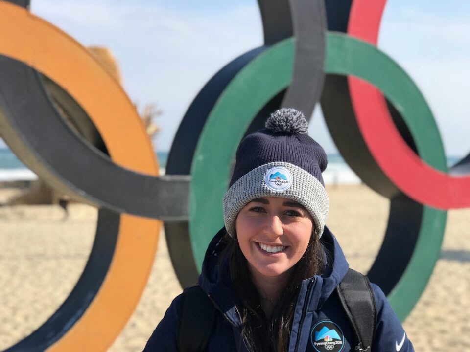 Lyndsey standing in the Olympic Village in PeyongChang, Korea.